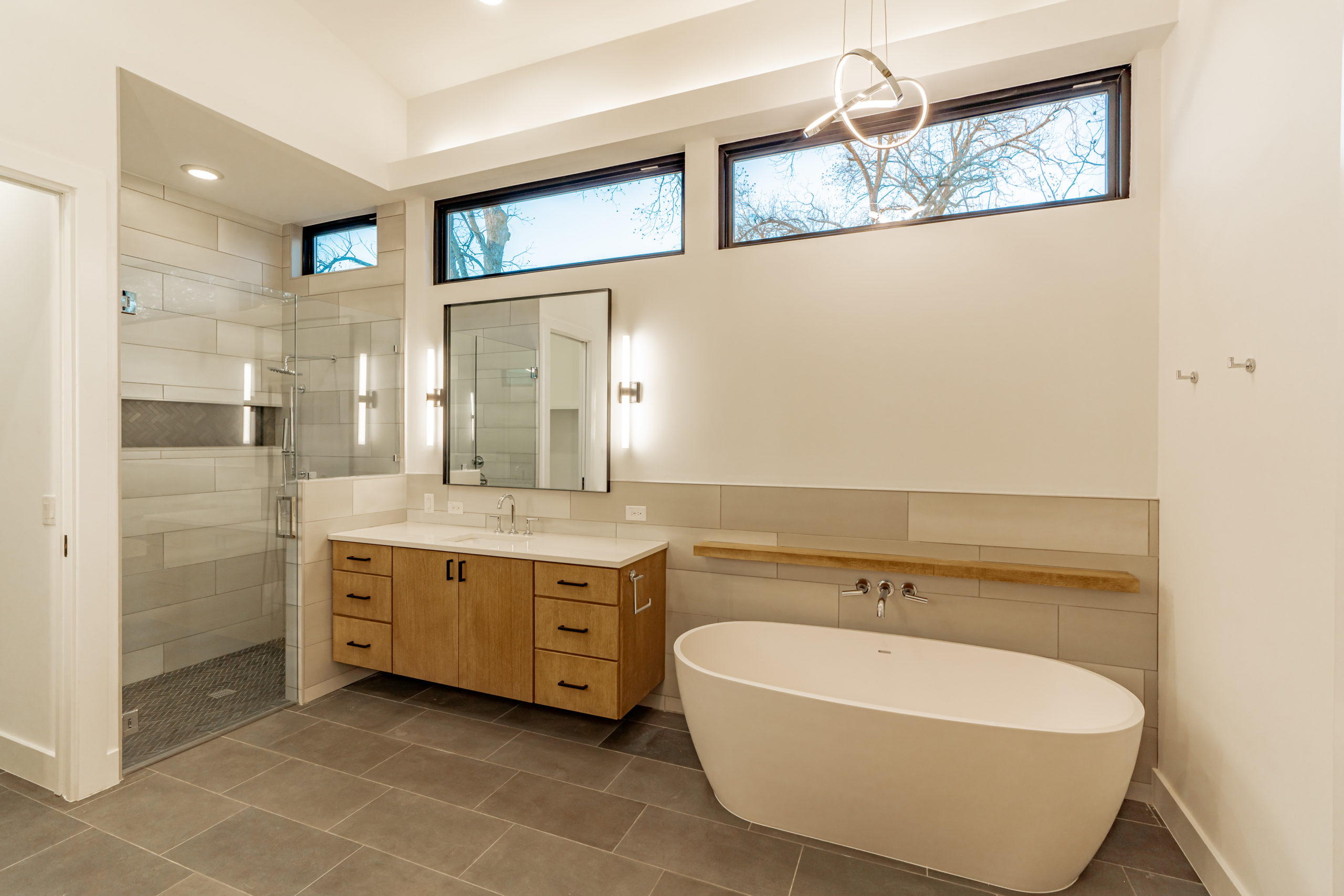 Woodview Custom master suite bath with shower and soaking tub