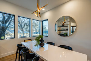 Dining room with chandelier at Zilker custom home