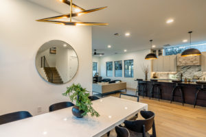 View from the dining room to the kitchen and living area at Zilker custom home