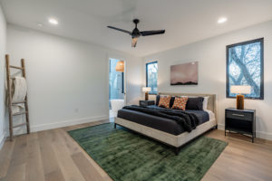 Luxurious master suite at 2007 De Verne custom home