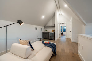 Third floor flex space with dry bar, full bathroom and spare bedroom at Zilker custom home